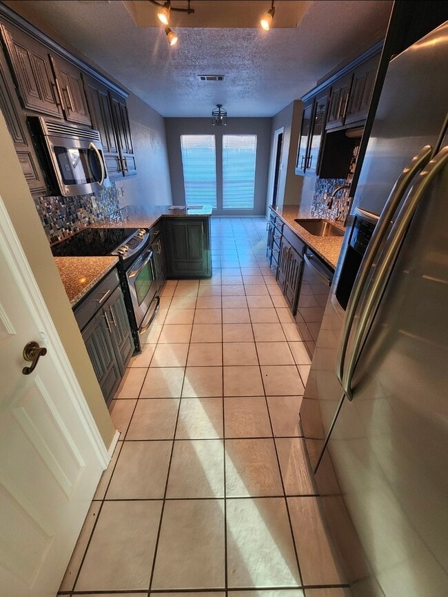 Photo - 3 bed 2 bath 2 car garage