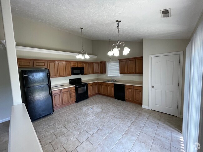 Building Photo - Three Bedroom Single Family Home - West La...