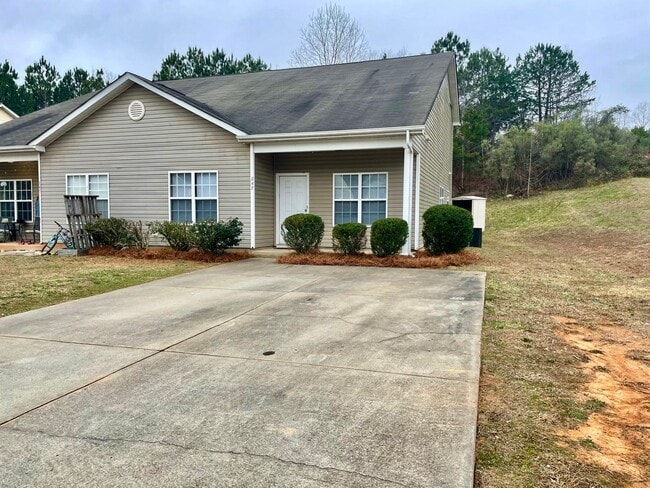 Building Photo - This two-story, 4-bedroom, 2-bath duplex in Fort Mill, SC sits on a corner lot