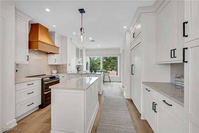 Building Photo - 5850 Pelican Bay Blvd Unit A3