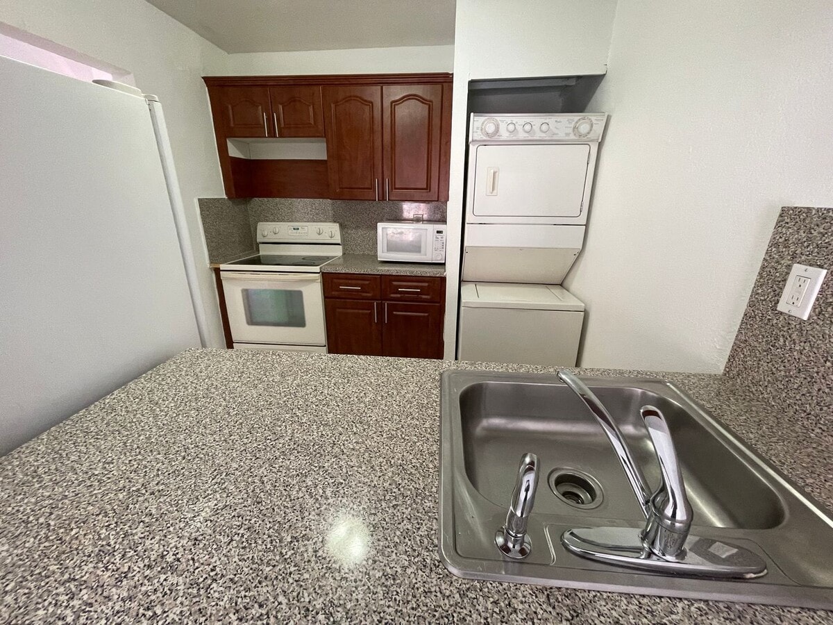 Photo - Spacious 1 Bed, 1.5 Bath Apartment in Gated Hialeah Community - Available July 2025!