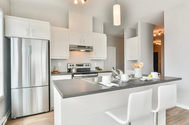 Building Photo - Le 6000 Tourbière