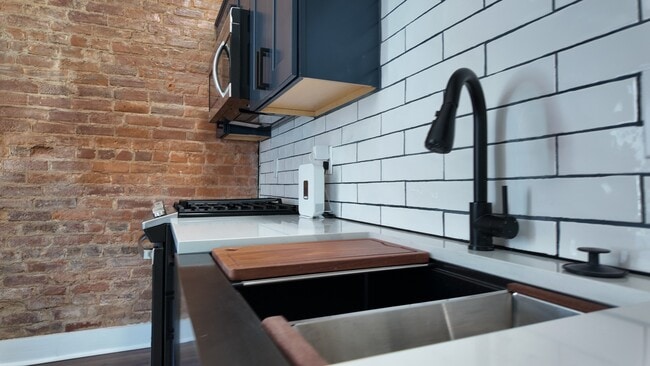 Photo - Brand-New 3BR/2BA Near Downtown & UC in OTR | Stylish Finishes, In-Unit Laundry, Gated Entry Unit 1