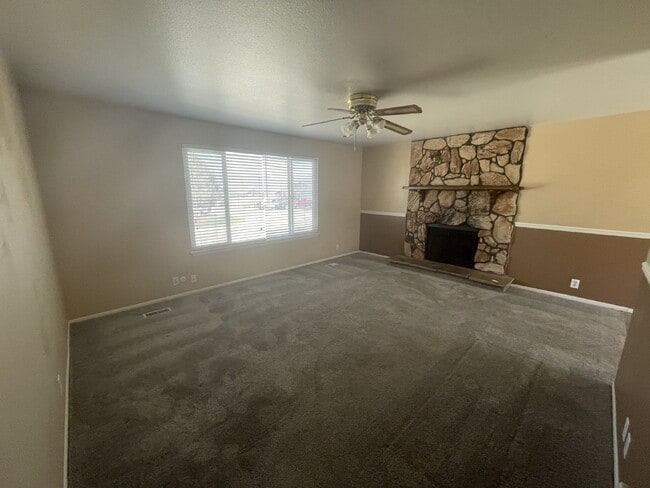 Photo - Spacious 6-Bed Oasis with Finished Basement & Cozy Fireplace.