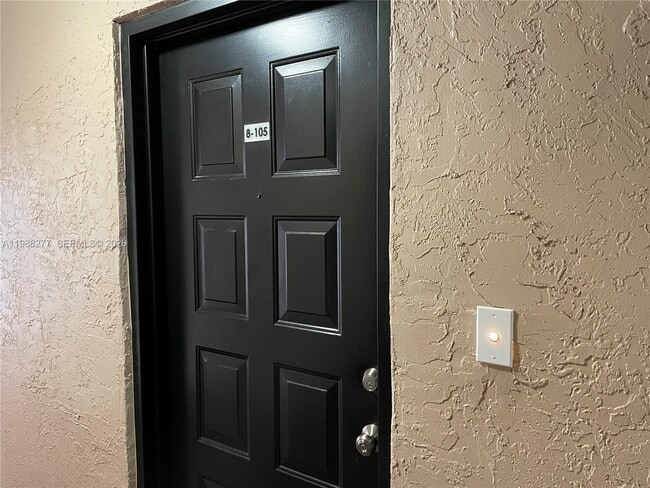 Photo - 8871 Wiles Rd Unidad 105