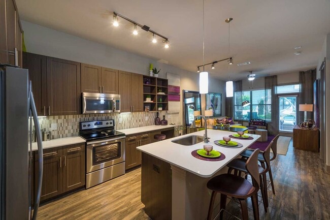 Building Photo - Sleek, Stylish, $1,000 Off Unit PWN1