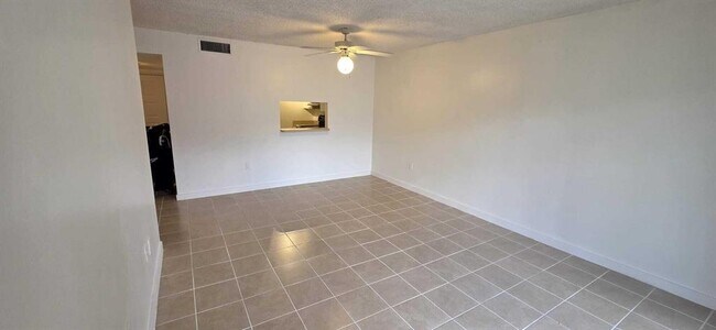 Photo - 711 N Pine Island Rd Unit #210