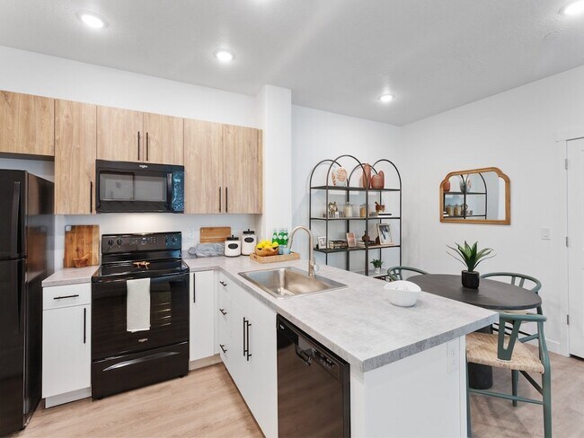 Cocina de concepto abierto - The Veridian Apartments & Townhomes
