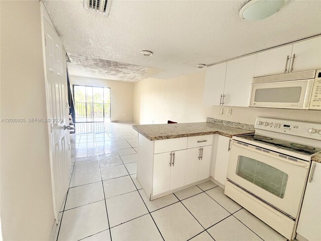 Photo - 5575 W 26th Ct Unit 203