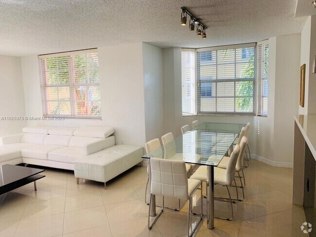 Building Photo - 19999 E Country Club Dr Unit 1407 Rental