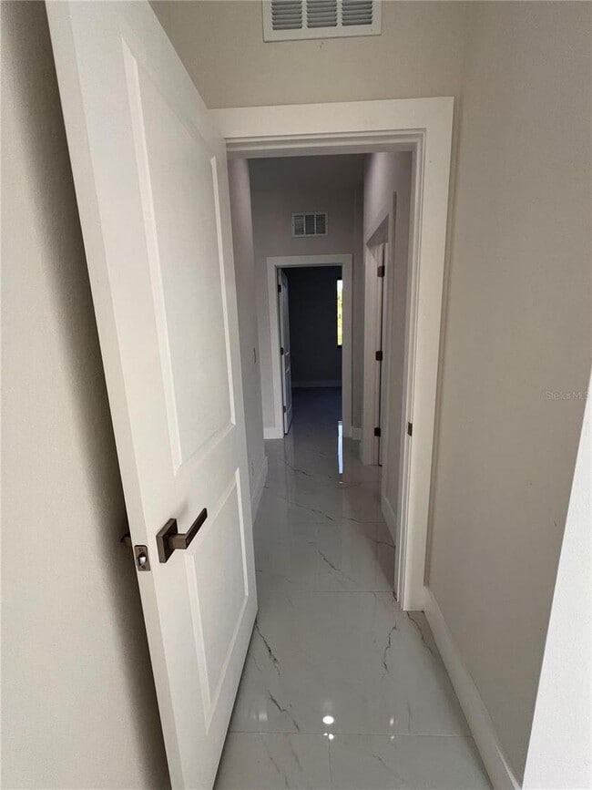 Photo - Be the first in occupy this 2025 constructed home in the vibrant city of Port Charlotte, FL! Qual...