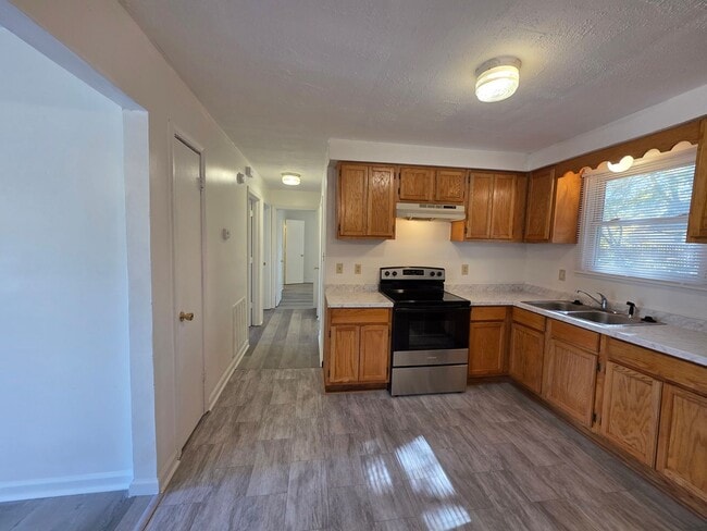 Photo - Charming 3-Bedroom Home with Spacious Backyard & Modern Amenities