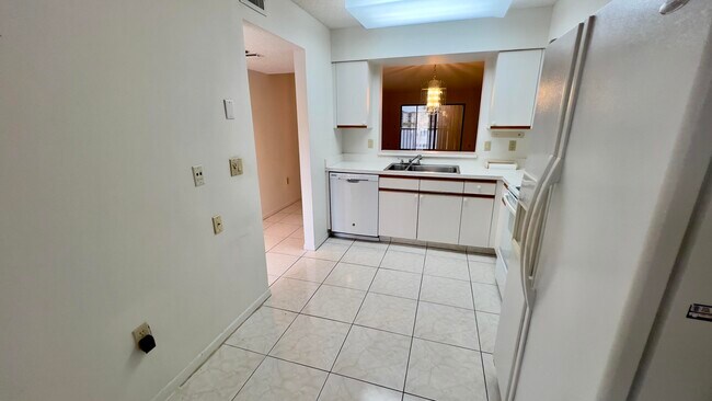Photo - 6121 Pointe Regal Cir Unit 209