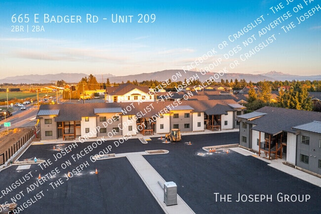 Building Photo - 665 E Badger Rd Unit 209