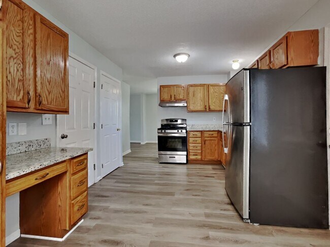 Photo - Charming 4-Bed, 2-Bath Home in Kansas City with Garage