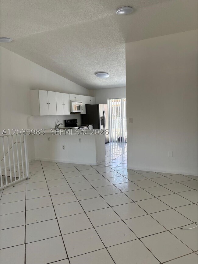 Building Photo - 7778 W 34th Ln Unit 20-201
