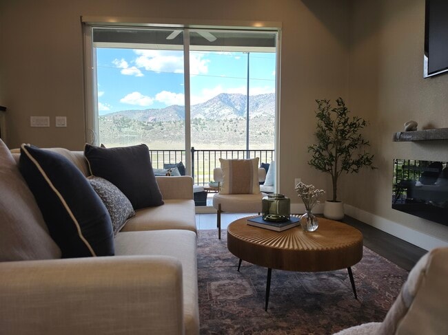Living room blends seamlessly into patio with mountain views - 2220 S McIntyre St