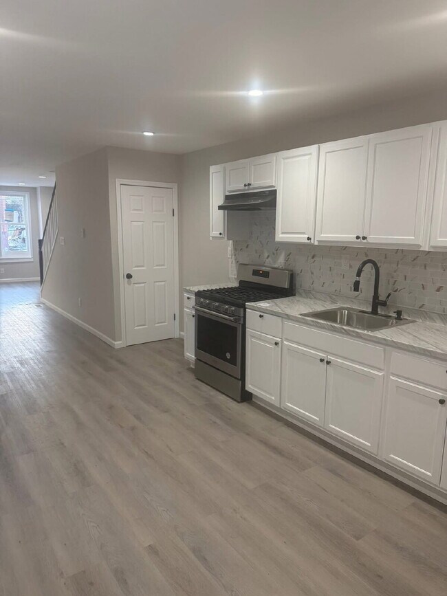 Photo - "Charming 4-Bedroom Townhouse in Trenton – Ideal Urban Living on MLK Jr. Blvd!"