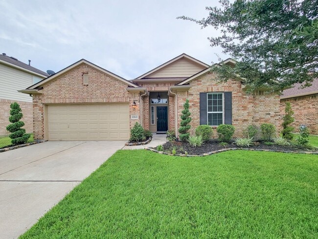 Building Photo - Welcome to this charming one-story home fe...