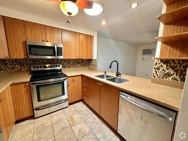 Building Photo - New partially furnished 2 bedroom / 2 bath... Rental