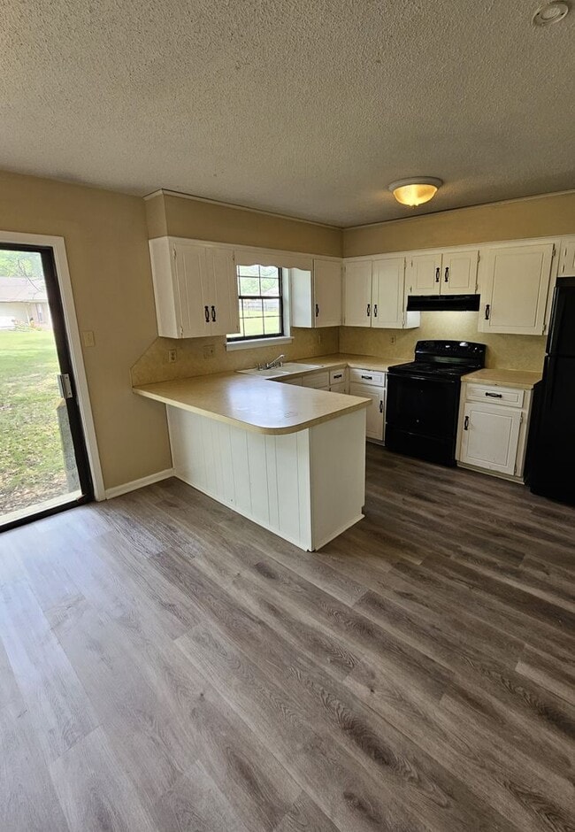 Photo - BELOW MARKET RENT!