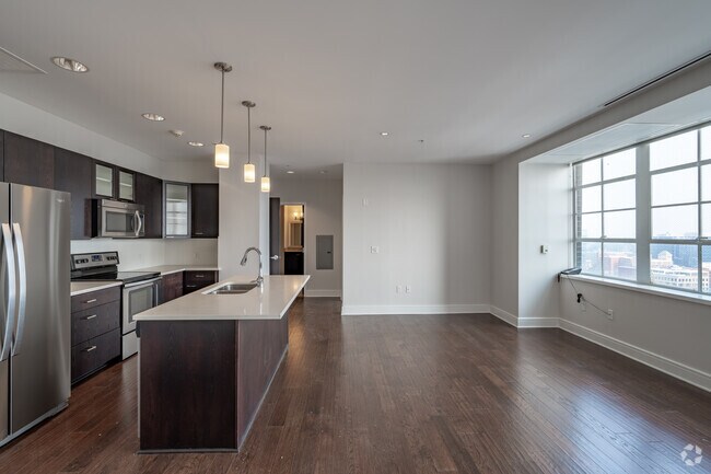 1BR, 1BA - 886SF - Kitchen and Living Area