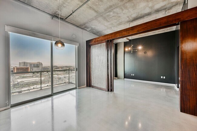 Photo - Modern Industrial Loft at Soho Lofts – 1BR/2BA High-Rise in the Arts District, City & Mountain Vi... Unidad 901