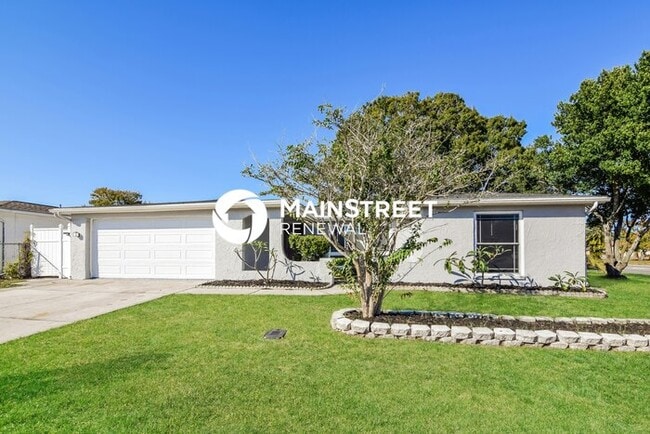 Building Photo - 3 Bedroom Pet-Friendly Home in Port Richey, FL with Main Street Renewal