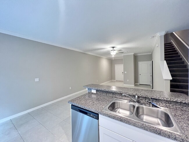 Photo - "Charming Gated community 3-Bed Retreat with Lake View & Granite Touches in Lutz!"