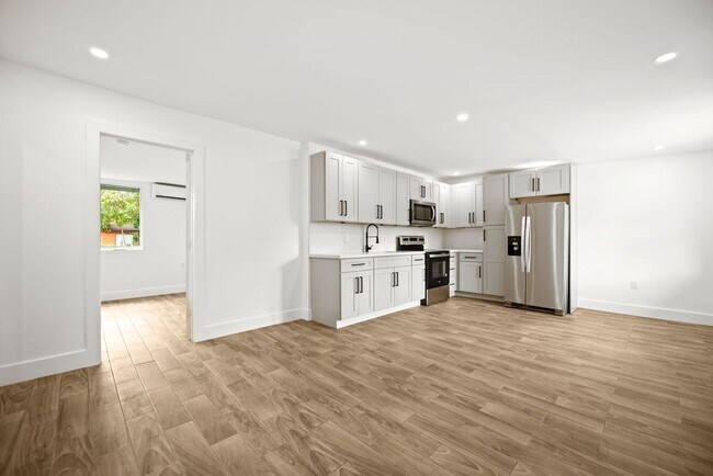 Building Photo - 10990 NW 18th Ave Unit Triplex  2