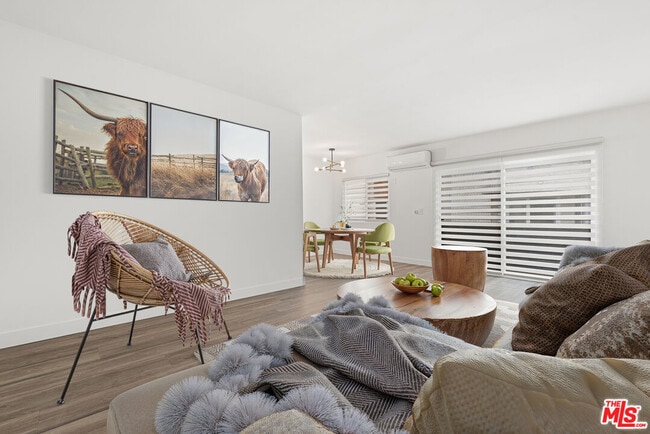 Building Photo - 3707 S Canfield Ave Unit 5