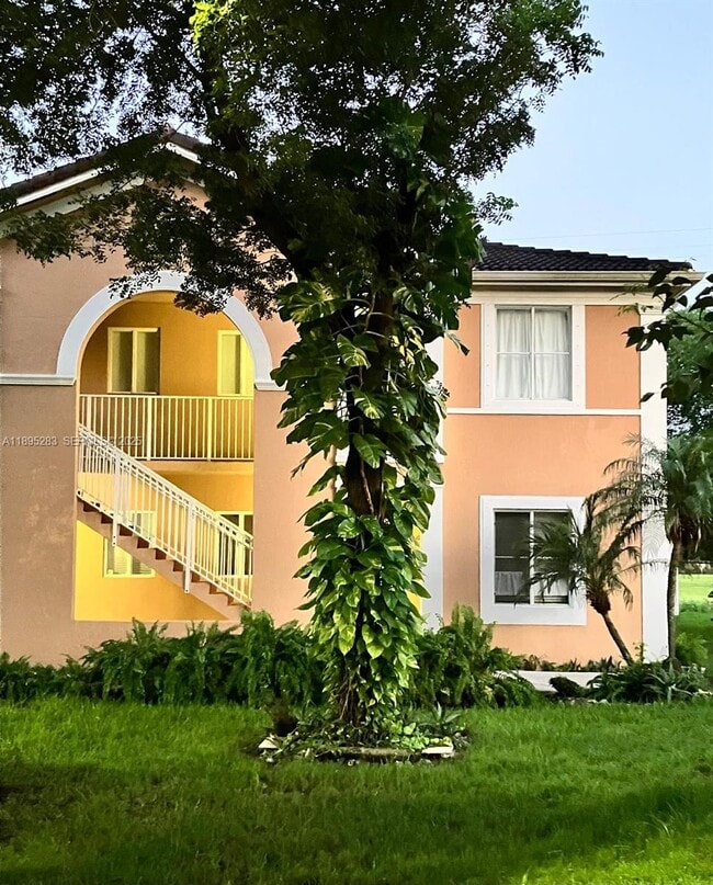 Building Photo - 17820 NW 73rd Ave Unit 109-1