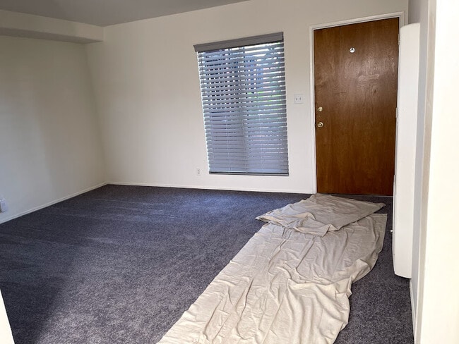 Living room, #10 (1BR) - 1945 Hillhurst Ave Apartments Unit 10