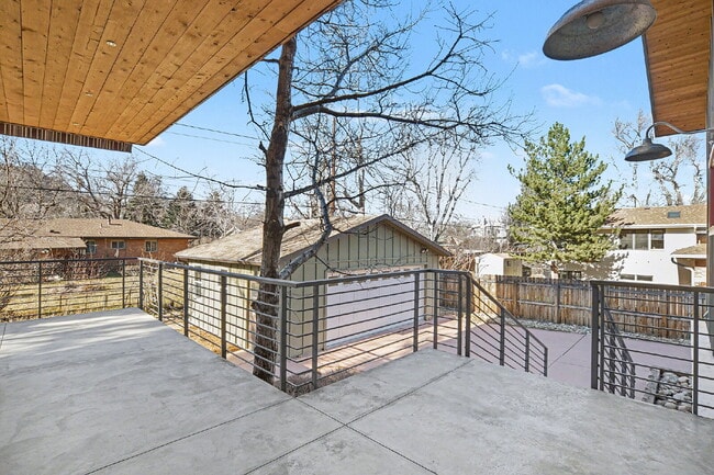 Photo - "Modern 4-Bed Boulder Retreat with Granite Elegance & Finished Basement!"