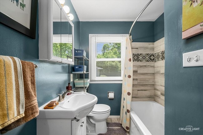 Photo - Charming Wheaton Cottage w/ Solar Panels, Finished Basement & 2-Car Garage