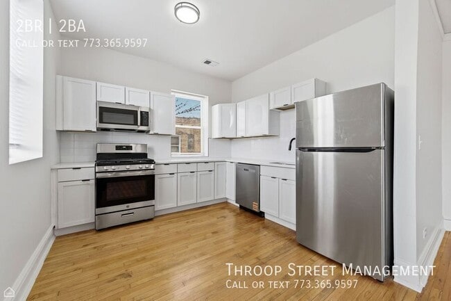 Building Photo - 6132 S Vernon Ave Unit 1N