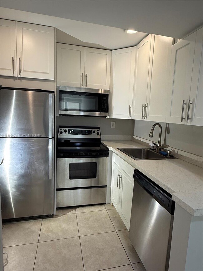Building Photo - 200 177th Dr Unit 407 Rental