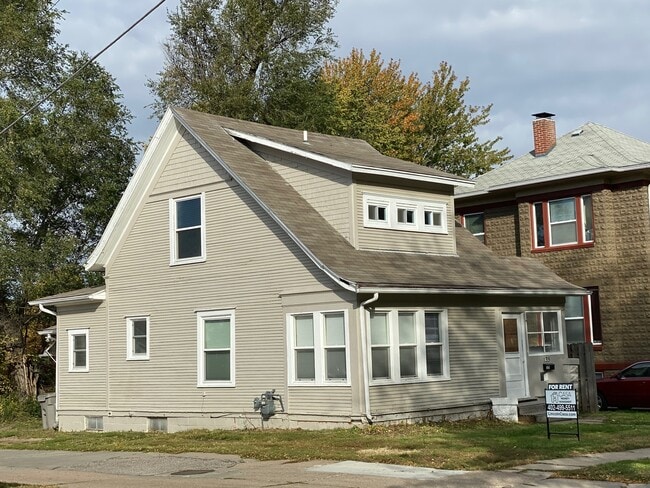 Photo - Large Kitchen, Hardwood Floors, Laundry in...
