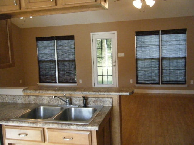 Photo - Charming 3BR/2BA Home with Open Floor Plan, Vaulted Ceilings & 2-Car Garage