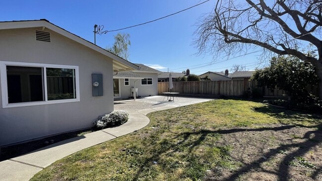 Photo - 4BD/3BA - Modern Home in Convenient Location: Updated Features, Near Parks & Shops, Pet-Friendly ...