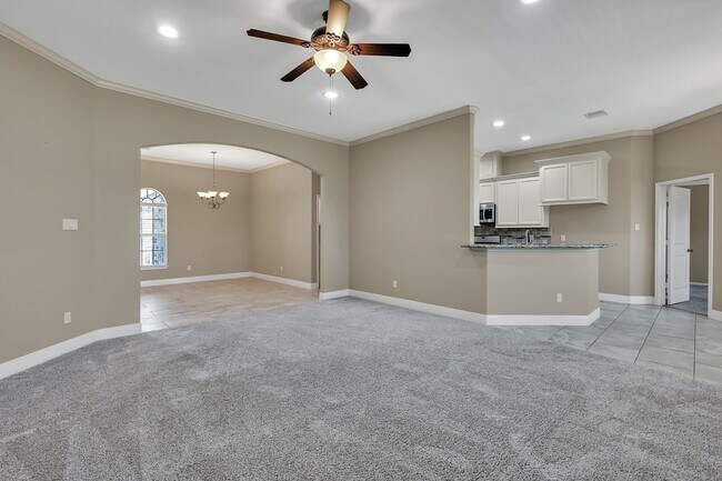 Photo - One story, and a 3-car garage!