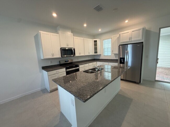 Photo - Brand new construction 3 Bedroom Town Home in Island Village of Celebration