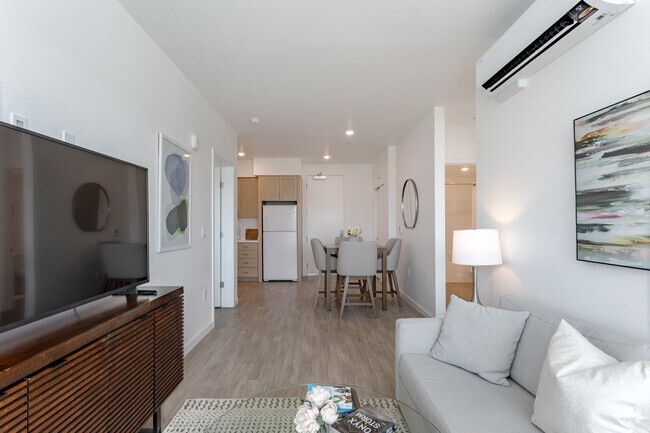 2BR, 1BA - 842SF - Living Room - View at Blossom Hill