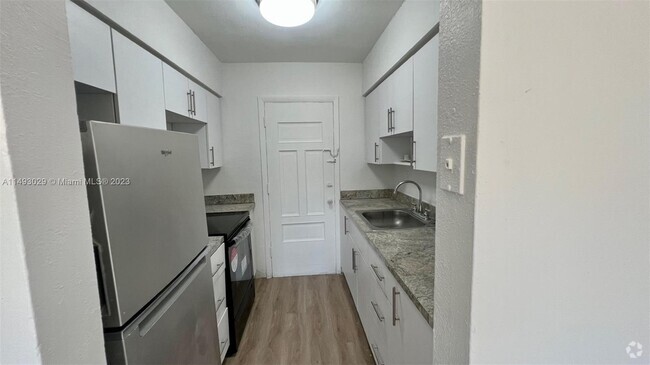 Building Photo - 3050 NW 42nd Ave Unit C209 Rental