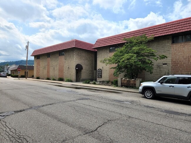 Building Photo - 301 E 1st Ave Unit #3