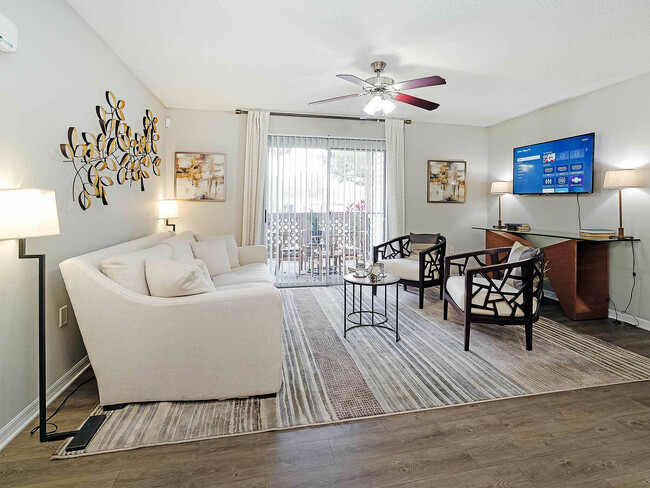 Step into elegance and comfort in this beautifully designed living room, perfect for relaxation and entertainment. - Advenir at The Oaks Apartments