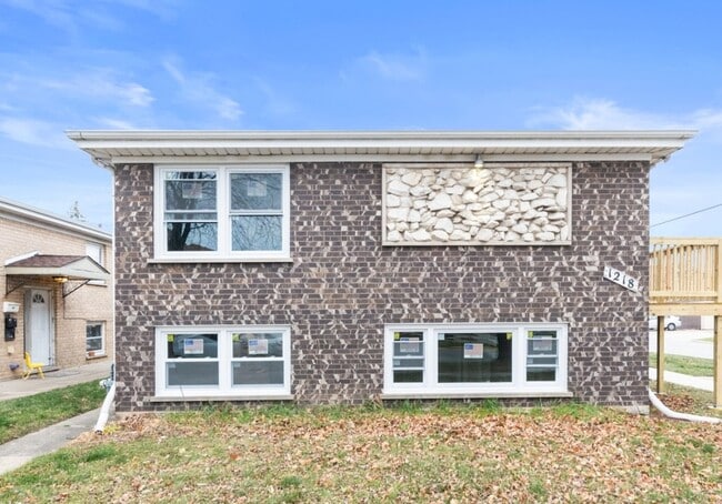 Building Photo - 1218 N 20th Ave Unit 1