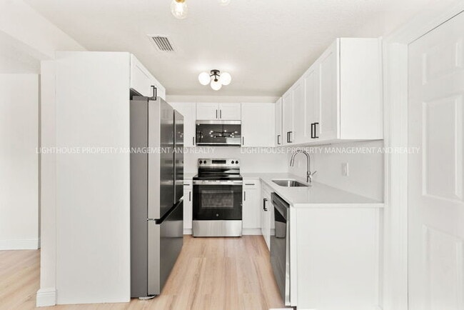 Photo - Newly Renovated 3 Bedroom Single-Family Home with Modern Finishes