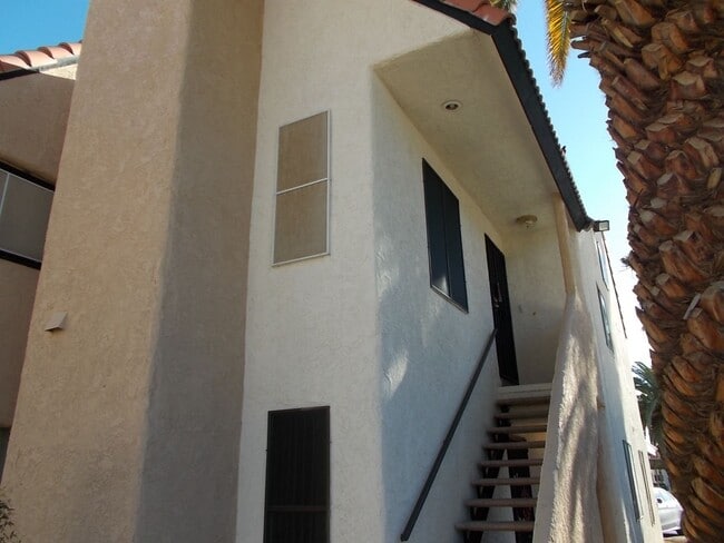 Photo - Elegant upstairs condo with modern upgrades and private balcony.