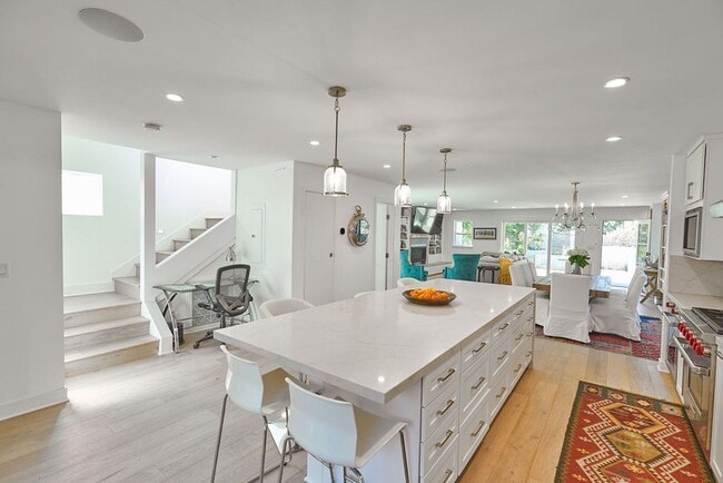 Building Photo - Spend the Holiday in Style | Fully Furnish...